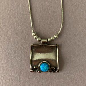 Silver pendant with small opal on a 16"chain